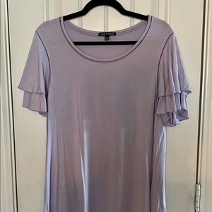 Lavender top with ruffle sleeves. Size XL